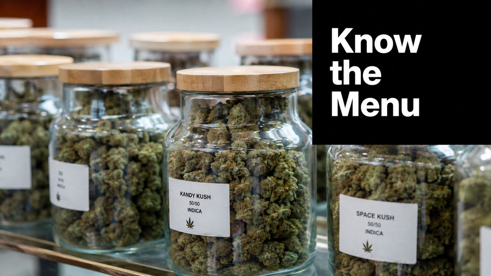 Several glass jars filled with various strains of cannabis flower arranged on a shelf for display.